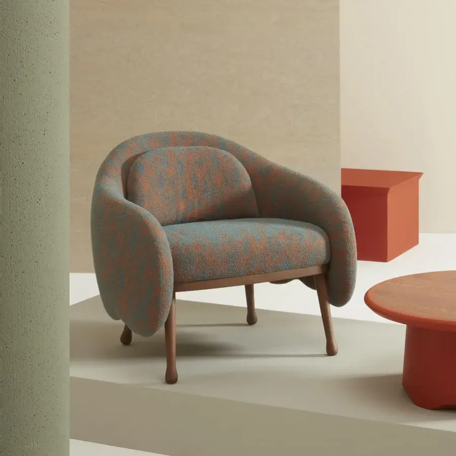 Distinguished Billiani Corolla lounge chair upholstered in textured teal and orange textile with a satin wood base