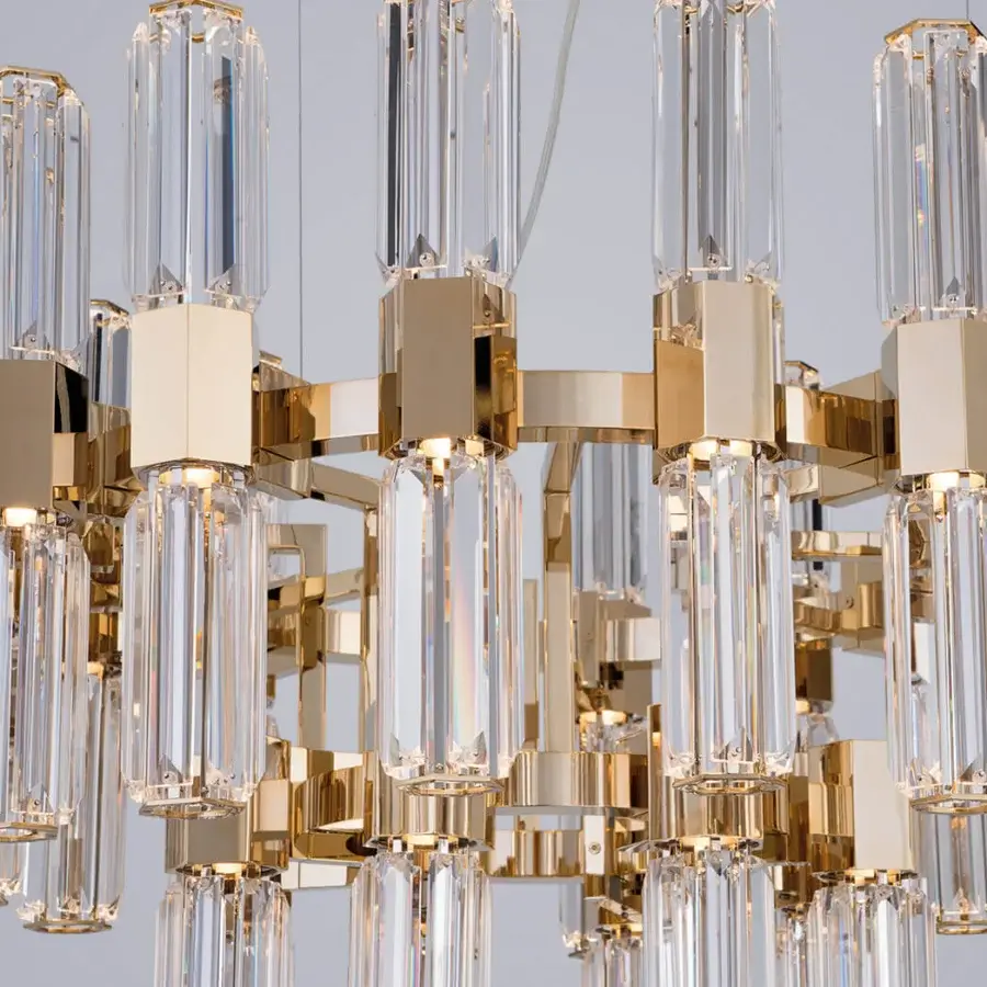 Exceptional Patrizia Garganti Chaos Orb chandelier crafted in glossy gold-finished metal and clear glass with interconnected hexagonal elements