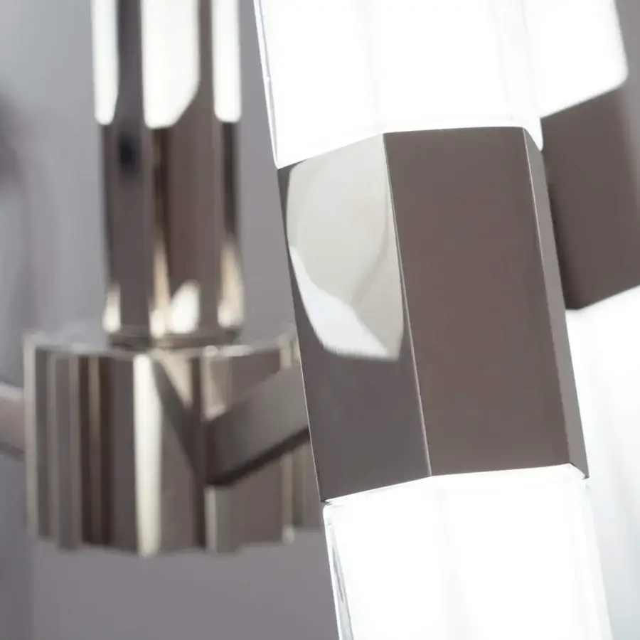 Elegant Patrizia Garganti Chaos chandelier built with translucent white accents and reflective polished metal
