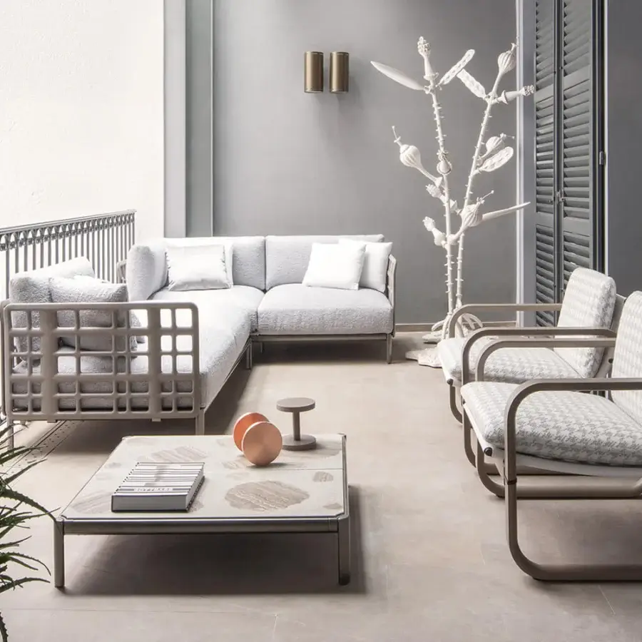 Luxury Giorgetti Aldìa sectional with a pewter-finished metal frame and reconstituted birch plywood in a natural finish