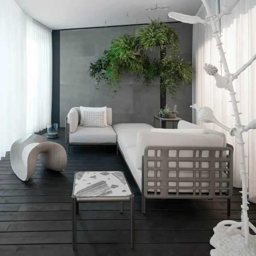 Sophisticated Giorgetti Aldìa sectional with a pewter-finished metal frame and natural reconstituted birch plywood backrests crafted in light creams and dark grays