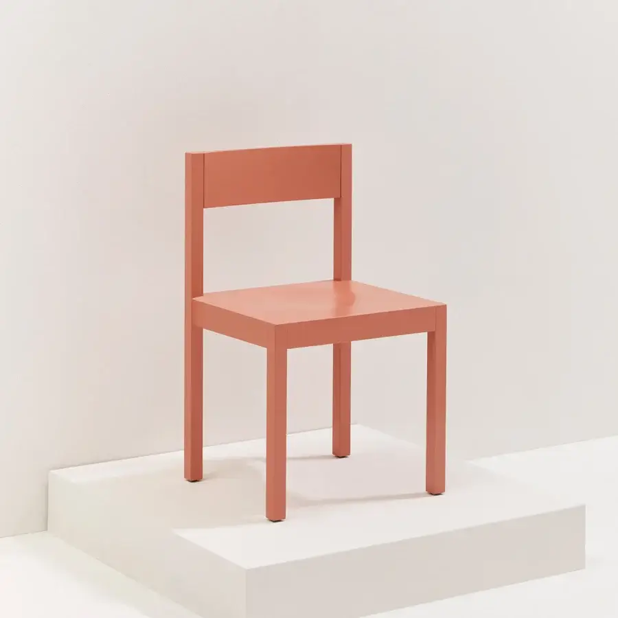Distinguished Billiani Archetype-A chair crafted in terracotta-red wood with a uniform matte finish