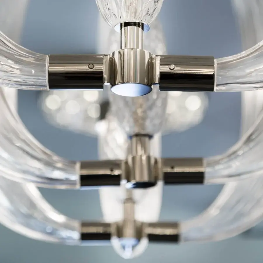Superior Patrizia Garganti Coup De Foudre 05 suspension lamp with polished metal and clear hand-blown glass elements crafted in a modular structure