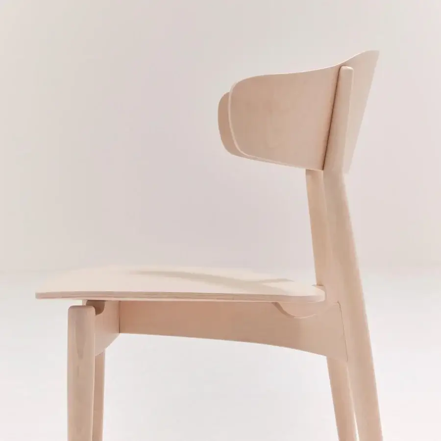 Exceptional Billiani Flow dining chair crafted in light wood with a smooth satin finish and gently curved form