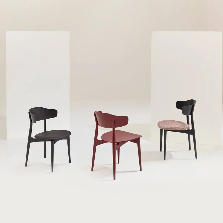 Sophisticated Billiani Flow dining chair with dark-toned wood and black textile, exhibiting clean lines with a gently curved backrest