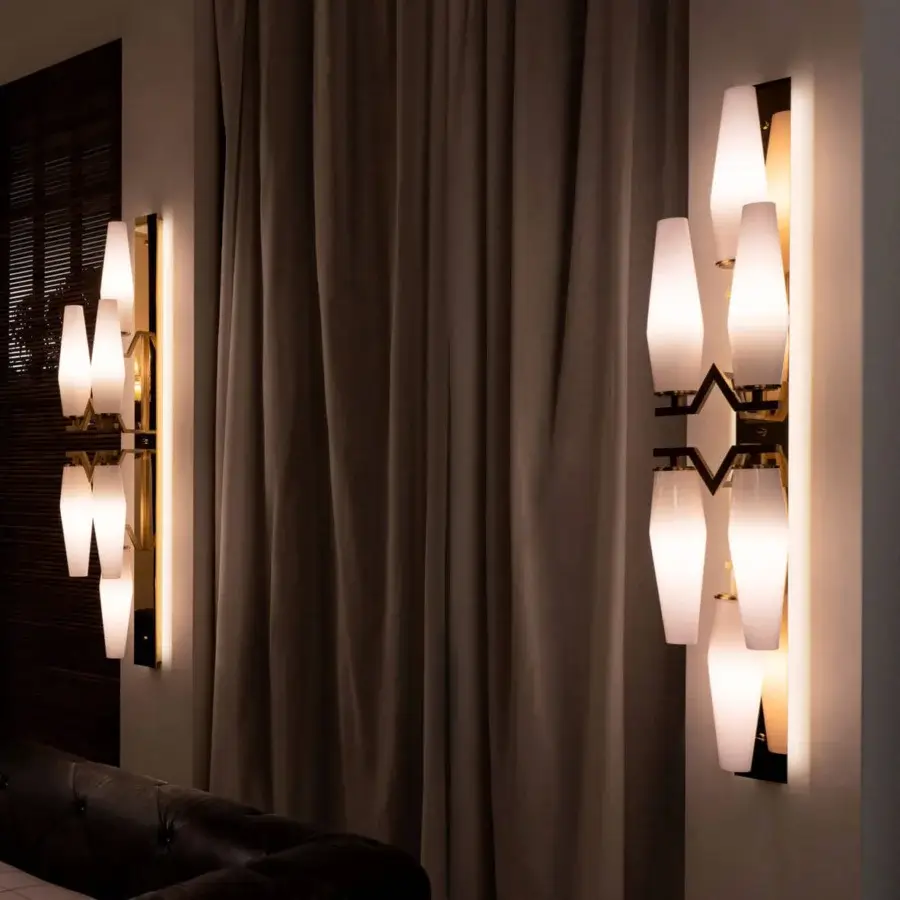 Distinguished Patrizia Garganti Frida wall lamp with vertically oriented shades in dark bronze and warm white hand-blown glass with a satin finish
