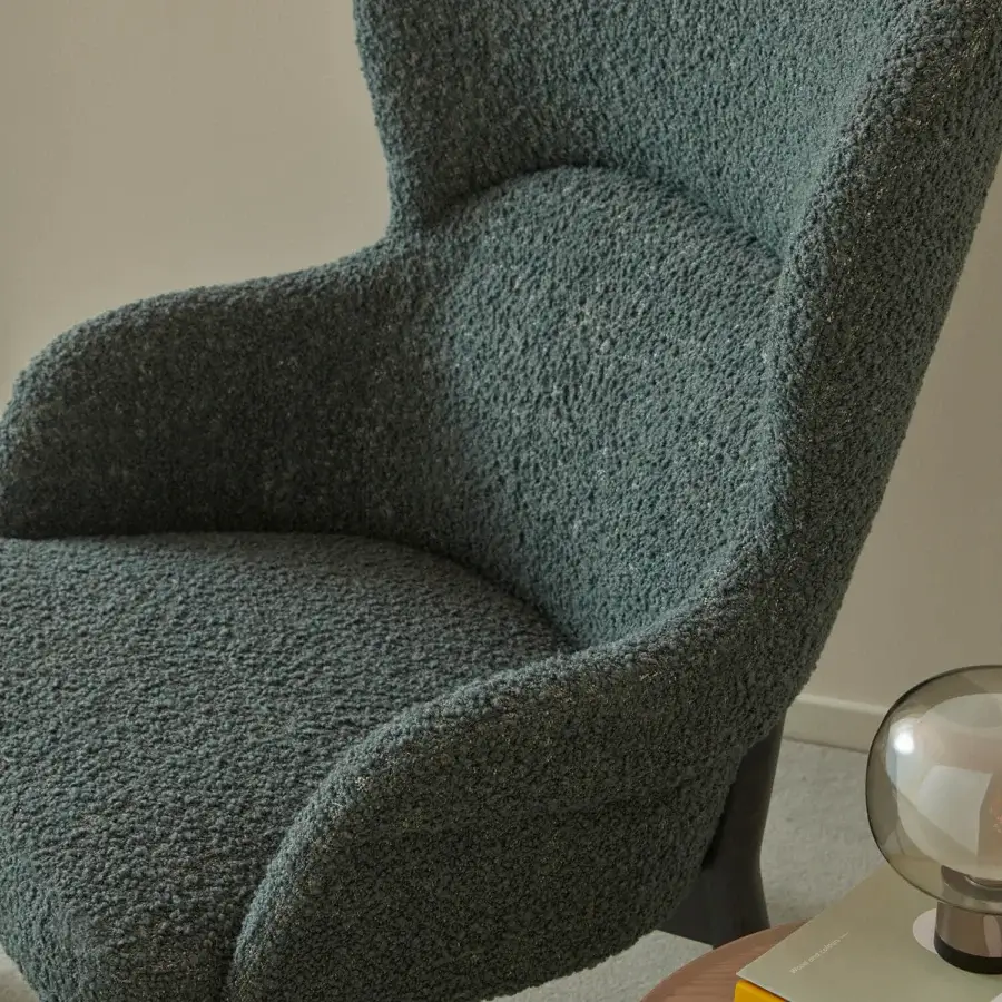 Exceptional Billiani Spy Lounge chair with organically curved form upholstered in textured dark teal bouclé textile crafted in Italy