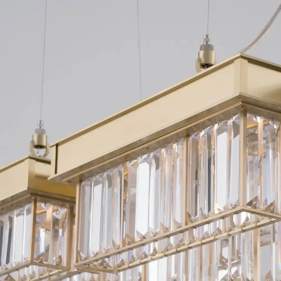 Distinguished Patrizia Garganti Gisele XL suspension lamp crafted in steel with clear glass elements and glossy golden finish
