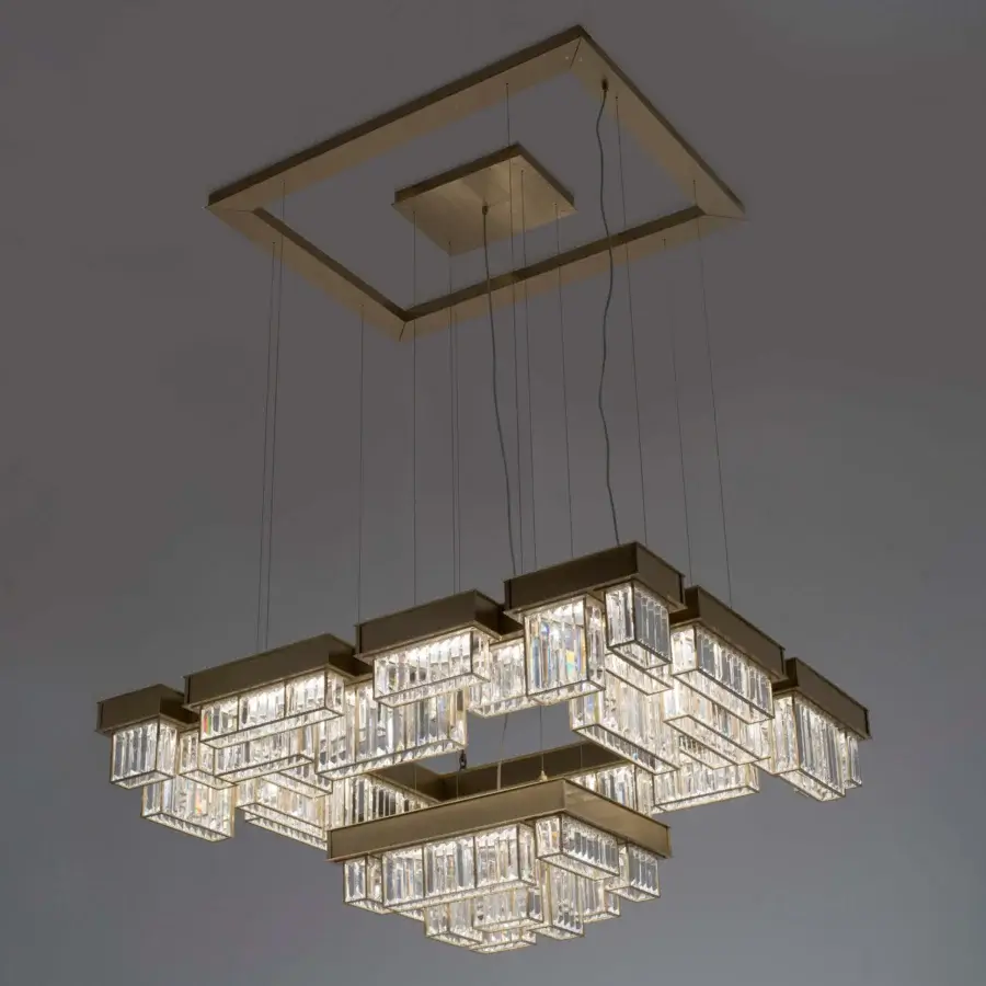 Distinguished Patrizia Garganti Gisele chandelier with geometric form, clear glass elements and brushed gold metal finish