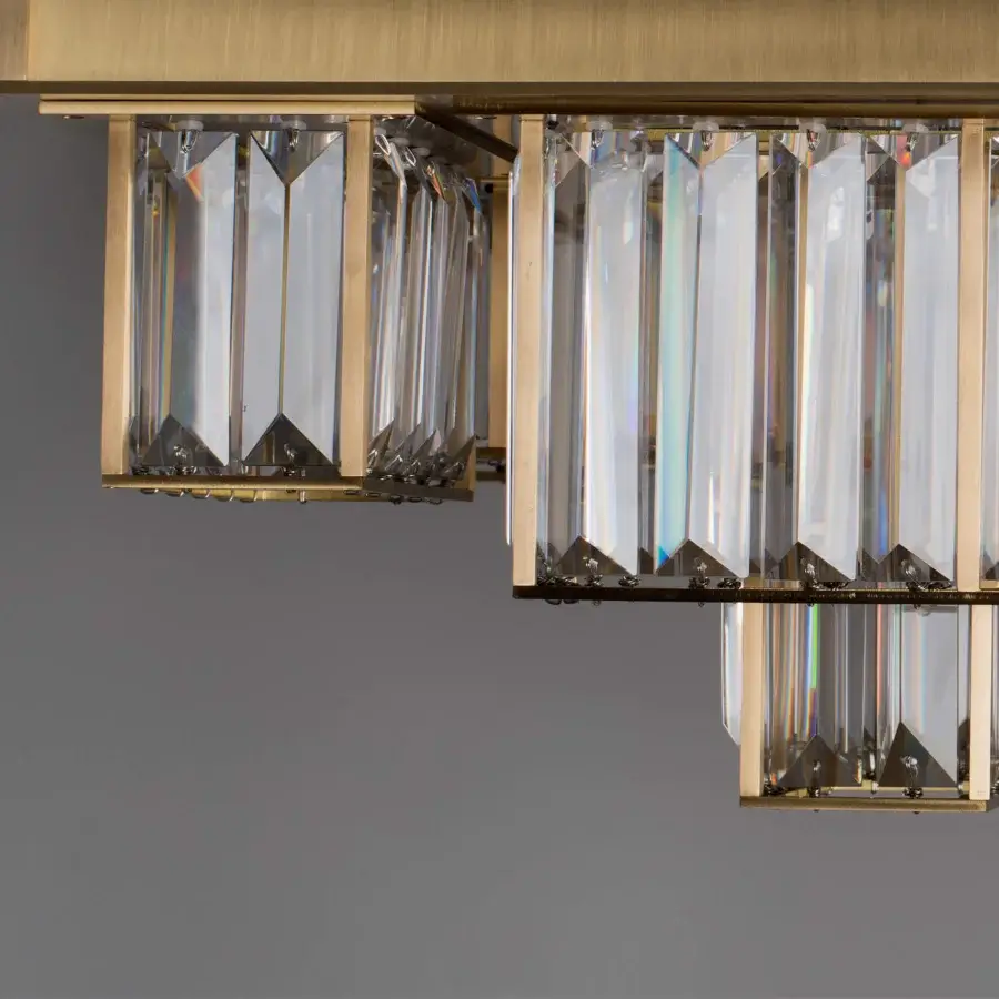 Distinguished Patrizia Garganti Gisele chandelier crafted in clear glass and brushed gold tone steel with integrated LED lights