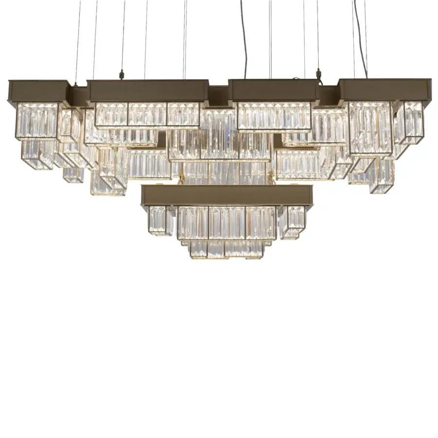 Distinguished Patrizia Garganti Gisele chandelier crafted in laser-cut steel with cascading clear glass prisms and warm golden finish