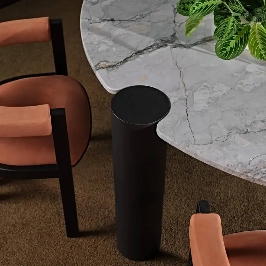 Superior Black Tie Amoris table built with polished marble and quartzite displaying white and gray veining in a matte black finish