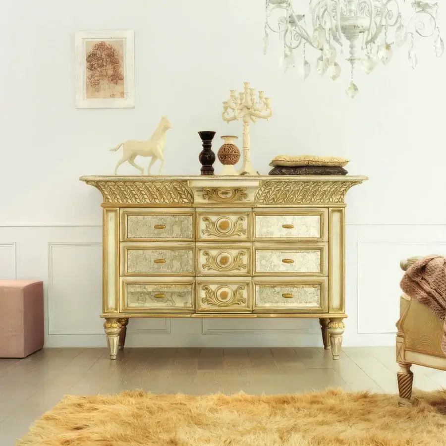 Lavish Faber Mobili Constellation dresser crafted in gold tone with floral carvings and antiqued ground mirrors