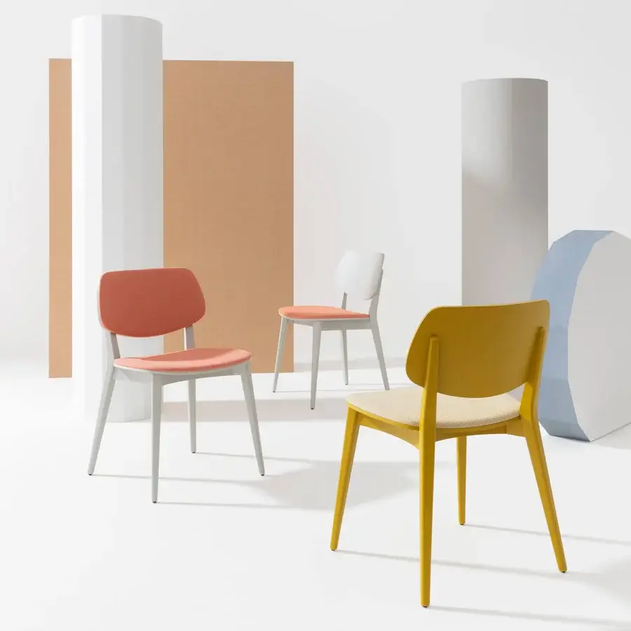 Superior Billiani Doll dining chair with coral-red textile upholstery and crisp white legs in satin finish plastic