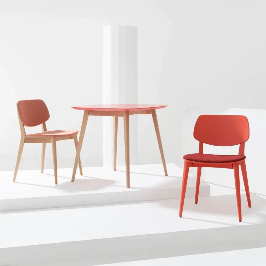 Exceptional Billiani Doll dining chair with a gently curved backrest and woven fabric seat in coral with a satin finish