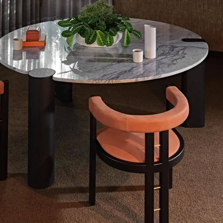 Superior Black Tie Kumiko chair with woven wooden backrest and coral textile upholstery crafted in Italy with golden accents