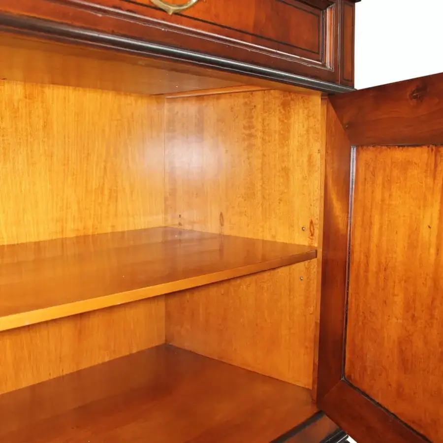 Superior Faber Mobili Chamonix sideboard crafted with walnut and walnut crotch wood in a rich reddish-brown finish with fluted pilasters