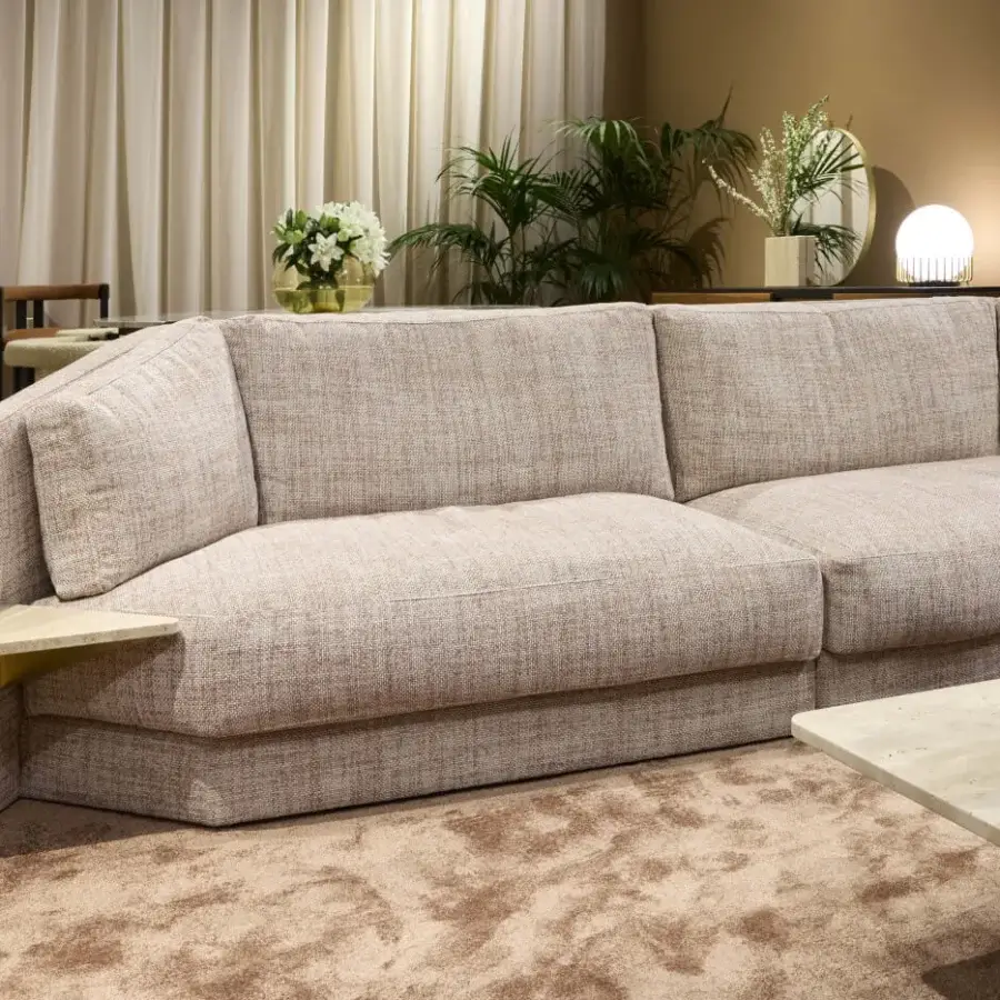 Superior Black Tie Lilith sofa with plush cushions, textured textile upholstery, and smooth light-colored wood integrated tables
