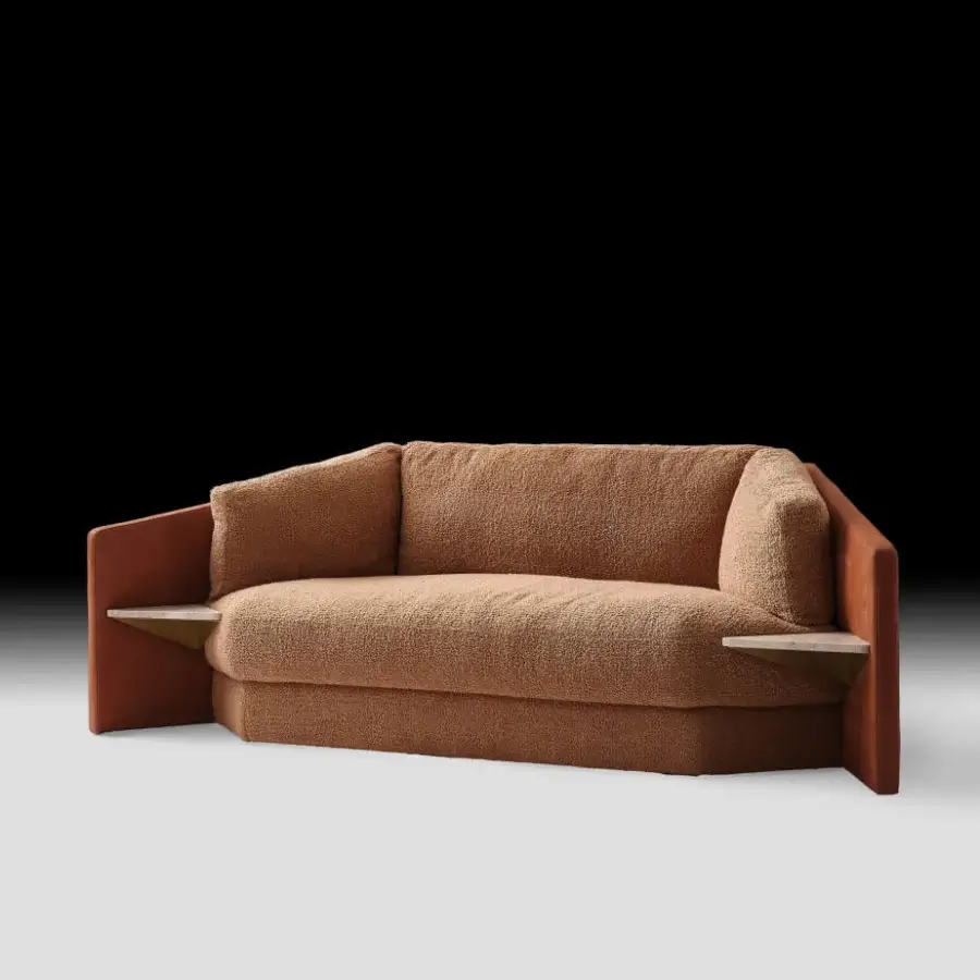 Exceptional Black Tie Lilith sofa with reddish-brown wood frame and plush textured bouclé cushions offering integrated side shelves
