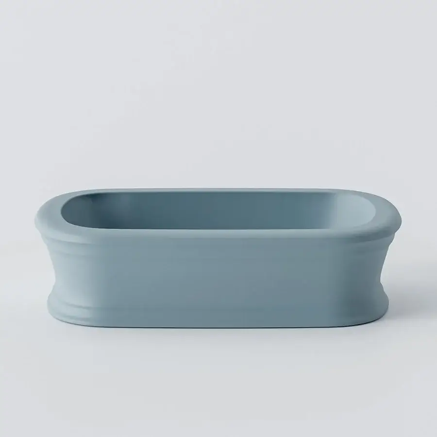 Superior Norah Design ARBA 02 washbasin sculpted with gently curved lines in muted blue-grey Norahcryl with velvety matte finish