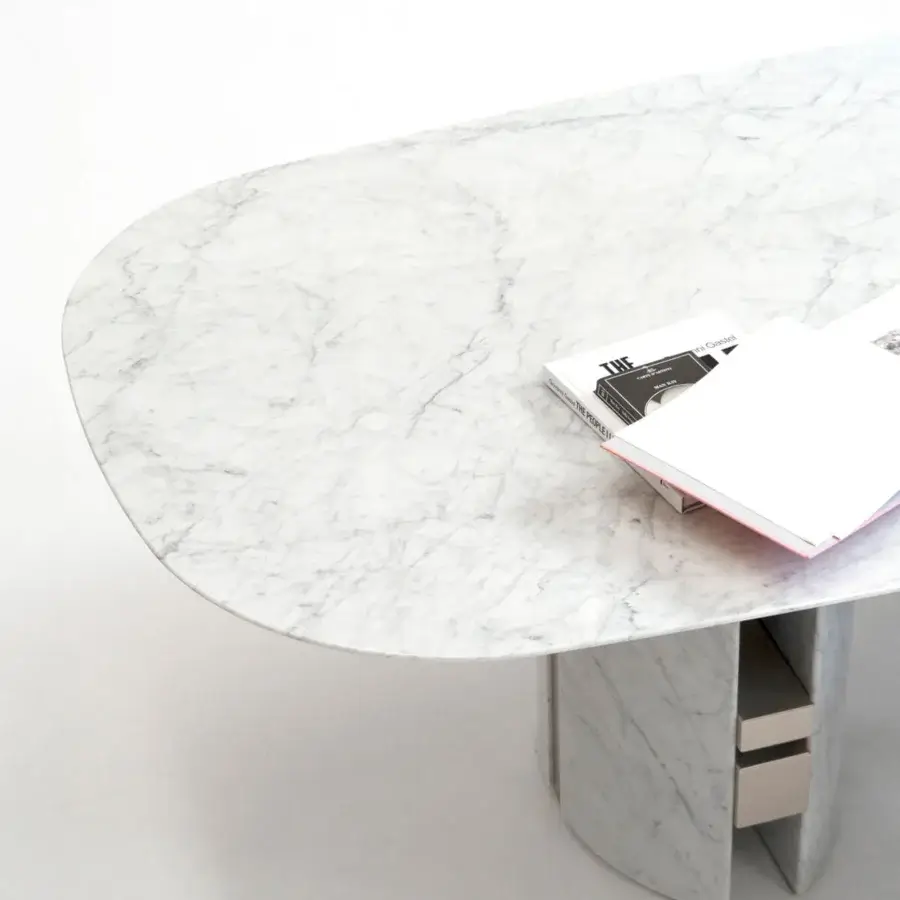 Elegant Capital Ercole table built in white marble with subtle gray and beige tones and layered base with recessed metallic details