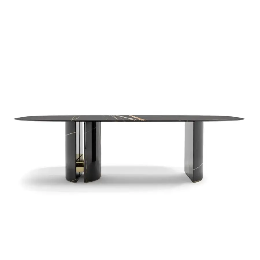 Distinguished Capital Ercole table built in dark polished marble with striking gold veining and glossy cylindrical bases