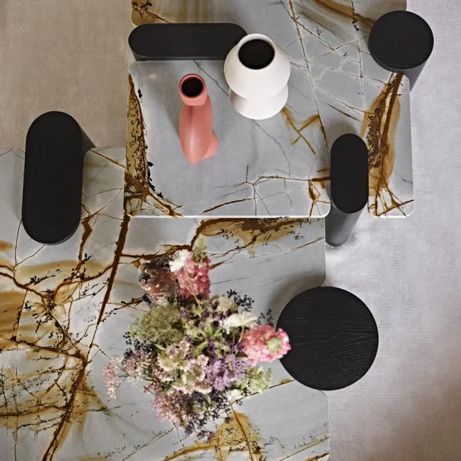 Exceptional Black Tie Amoris coffee table crafted with marble and quartzite displaying golden veining in a matte finish