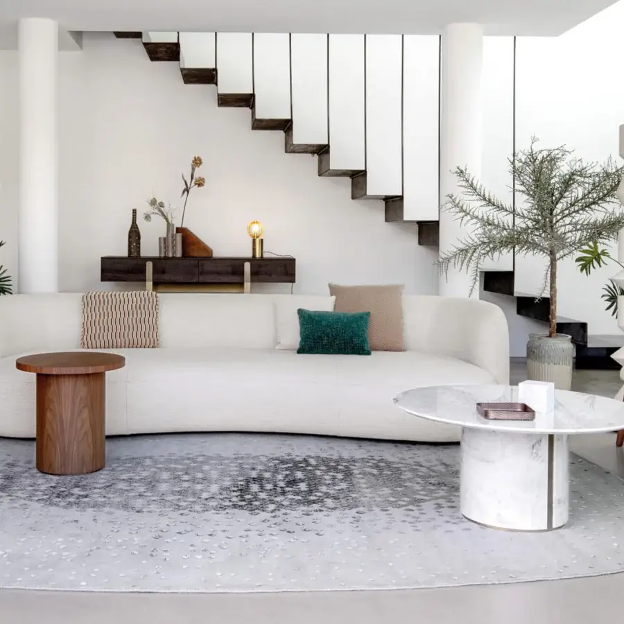 Distinguished Capital Ercolino coffee table built in luminous marble with a dark-toned walnut wood base and smooth finish
