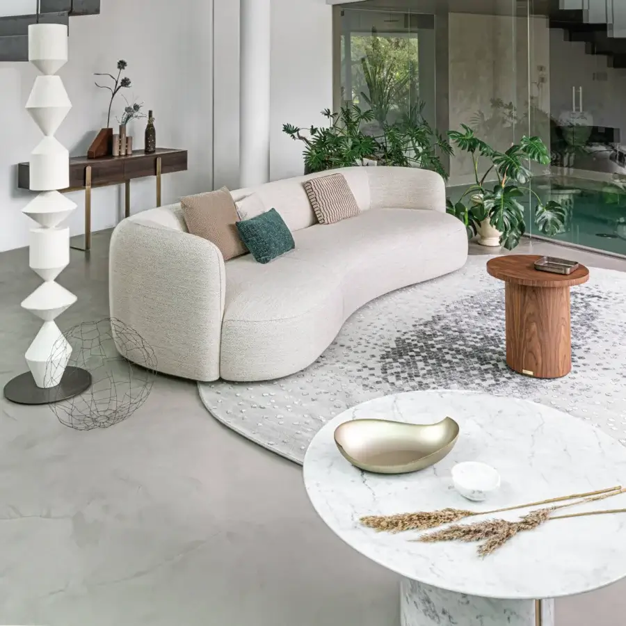 Exceptional Capital Ercolino coffee table crafted in luminous marble with a dark brown satin finish wood base
