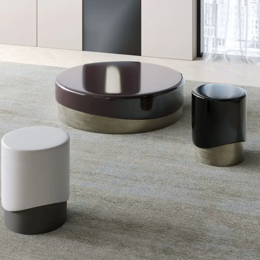 Exceptional Capital Merian coffee table with a luminous glossy burgundy surface and brushed metallic finish base