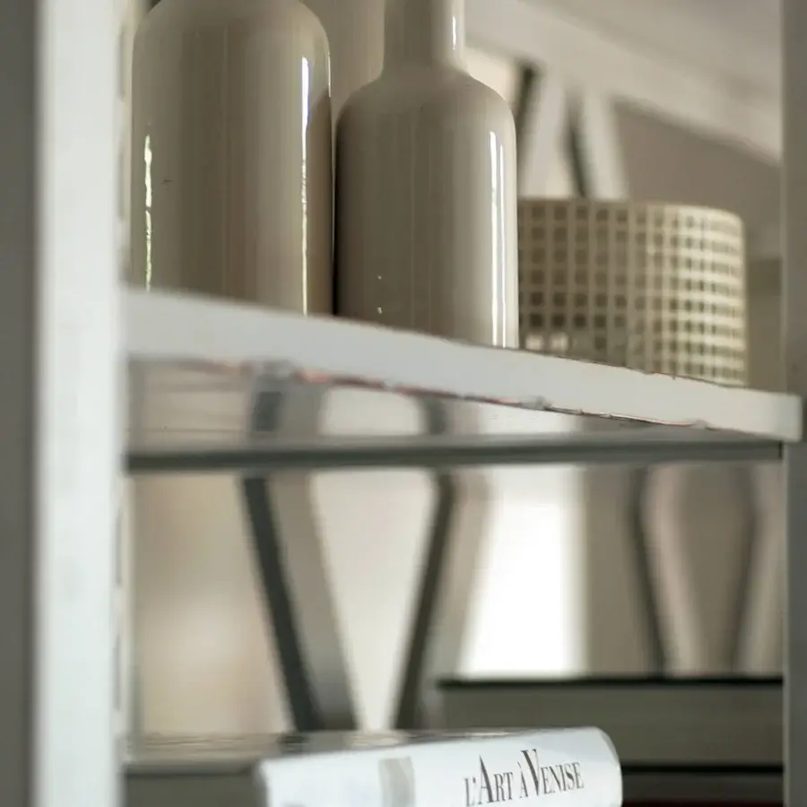 Exceptional Faber Mobili Khaju bookcase built in wood with a smooth matte finish and distinctive crisscross panels