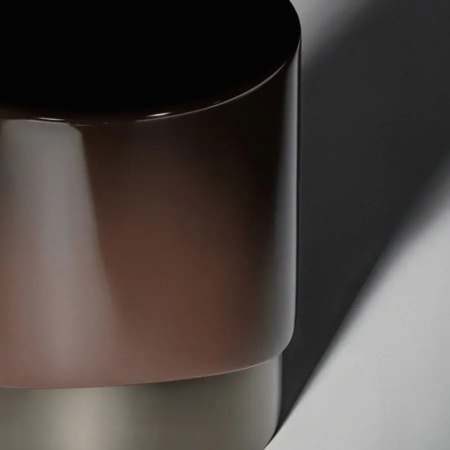 Superior Capital Merian side table with fluid lacquered surface and solid metallic-finish base in warm brown tones