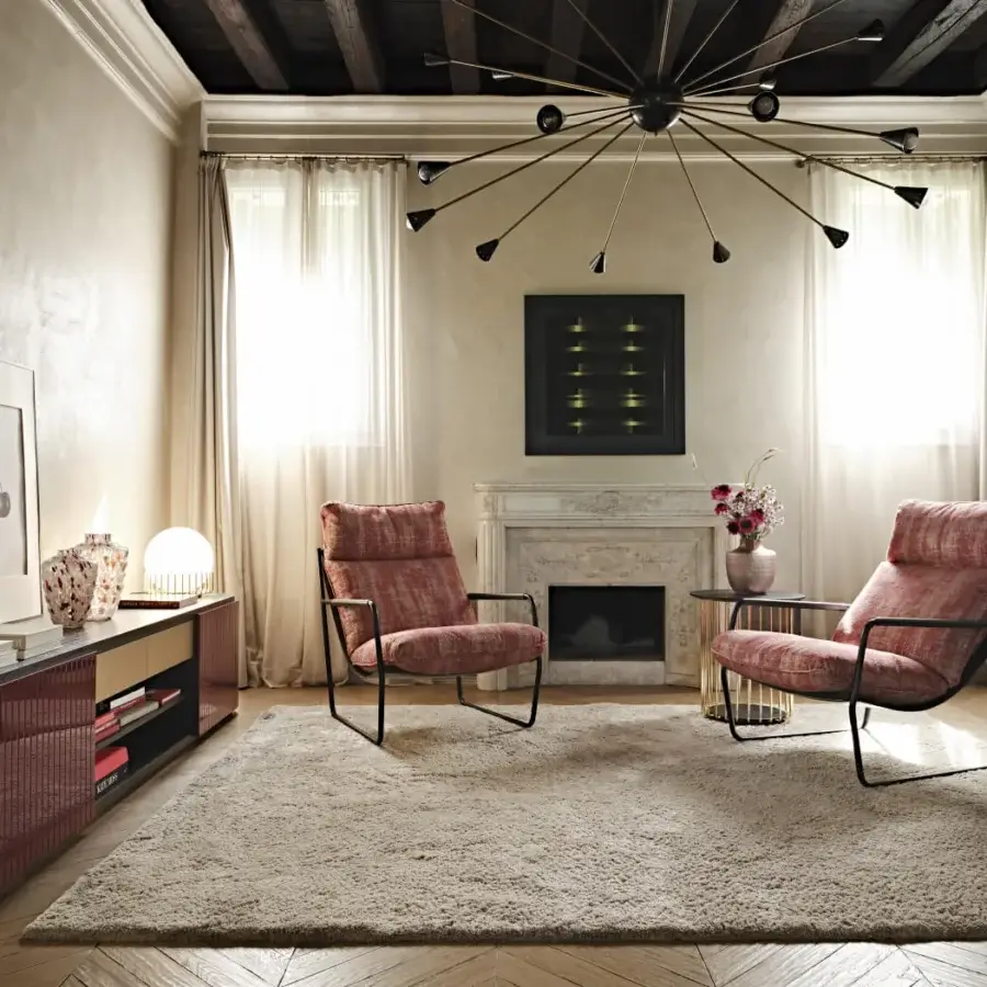 Exceptional Black Tie Clizia lounge chair with muted rose textile upholstery and matte dark-toned metal frame