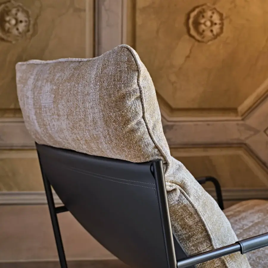 Distinguished Black Tie Clizia lounge chair with golden-beige textured textile upholstery and matte dark metal frame