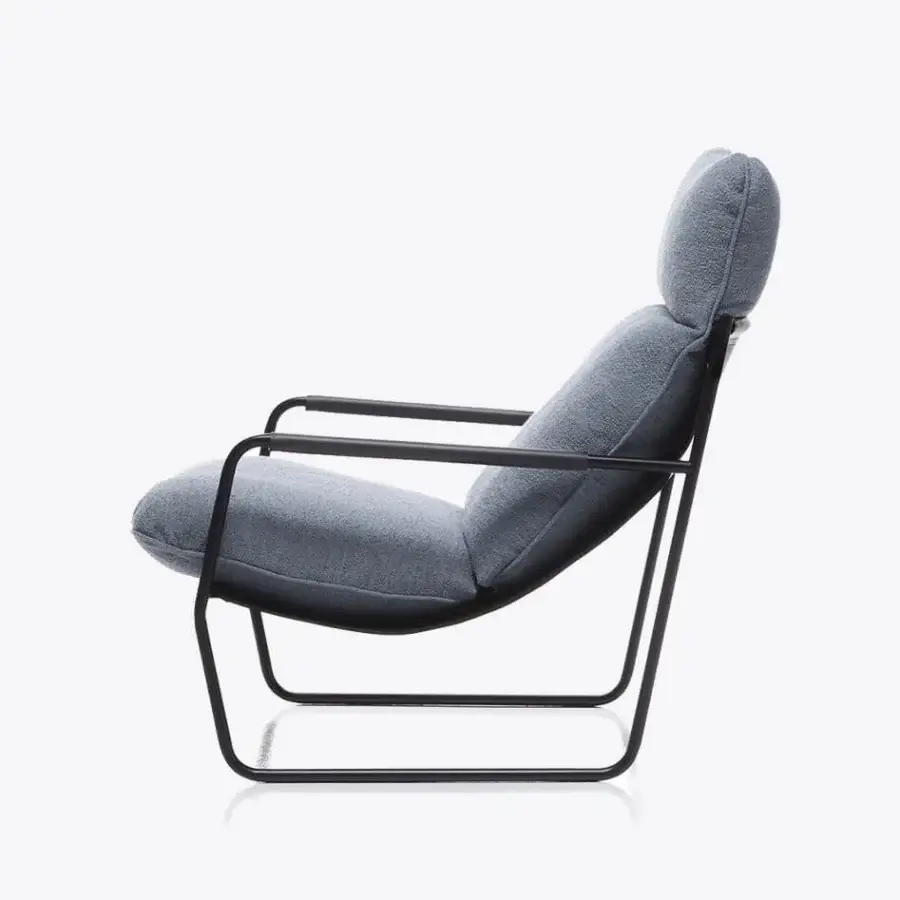 Distinguished Black Tie Clizia lounge chair with muted gray-blue textile upholstery and matte black metal frame crafted in Italy
