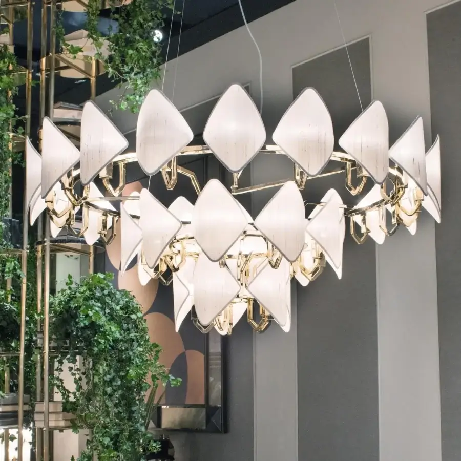 Lavish Patrizia Garganti Holly Units chandelier in bright gold-toned metal with pale white leaf-shaped elements crafted in Italy