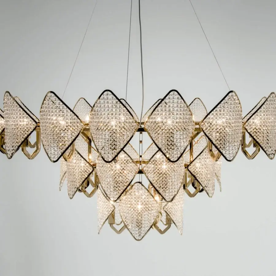Distinguished Patrizia Garganti Holly Units chandelier in warm gold-toned metal with clear faceted glass elements and metallic finish