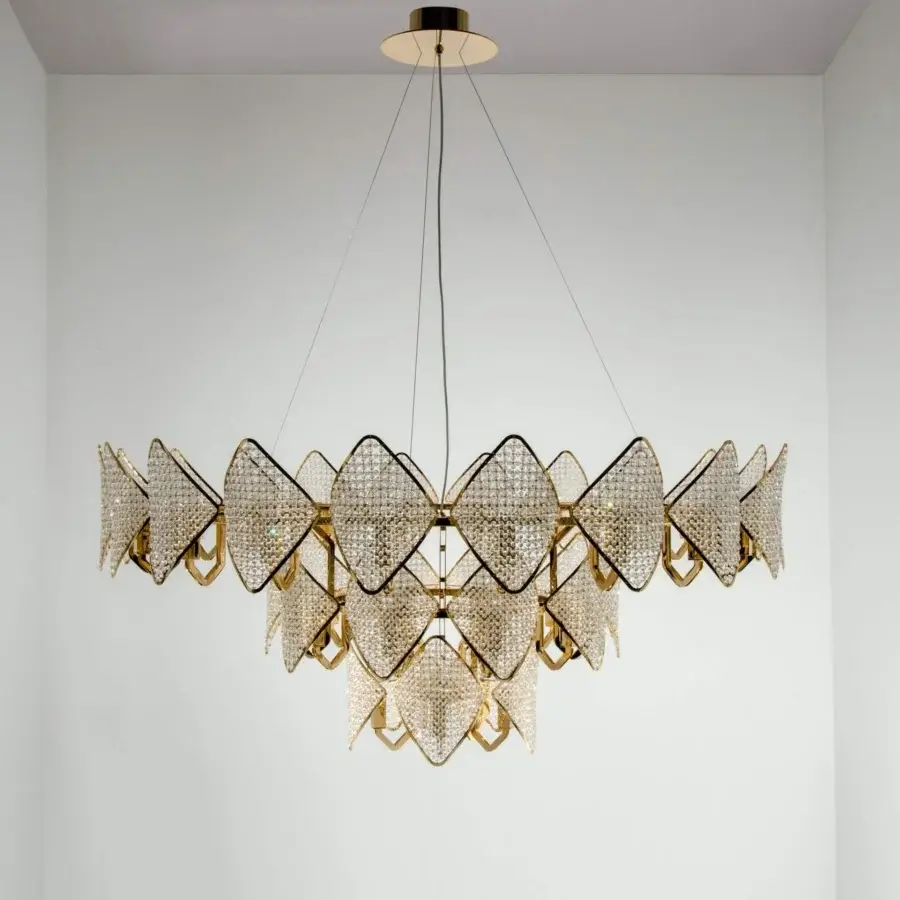 Exceptional Patrizia Garganti Holly Units chandelier in warm gold-toned metal crafted with faceted glass-like elements and curved lines