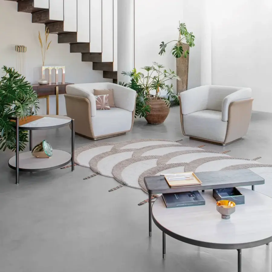 Sophisticated Capital Allure lounge chair upholstered in light beige fabric with a subtly textured finish and wooden base with metal accents