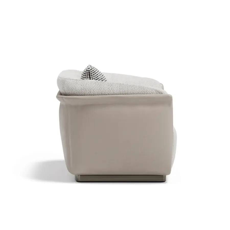 Distinguished Capital Allure lounge chair upholstered in neutral beige fabric with a black and white patterned cushion and sleek wooden base