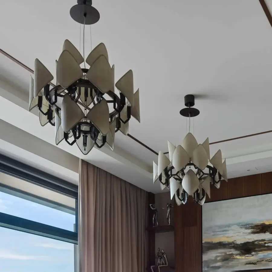 Elegant Patrizia Garganti Holly Units chandelier with luminous petal-like elements crafted in matte material and dark metal framework