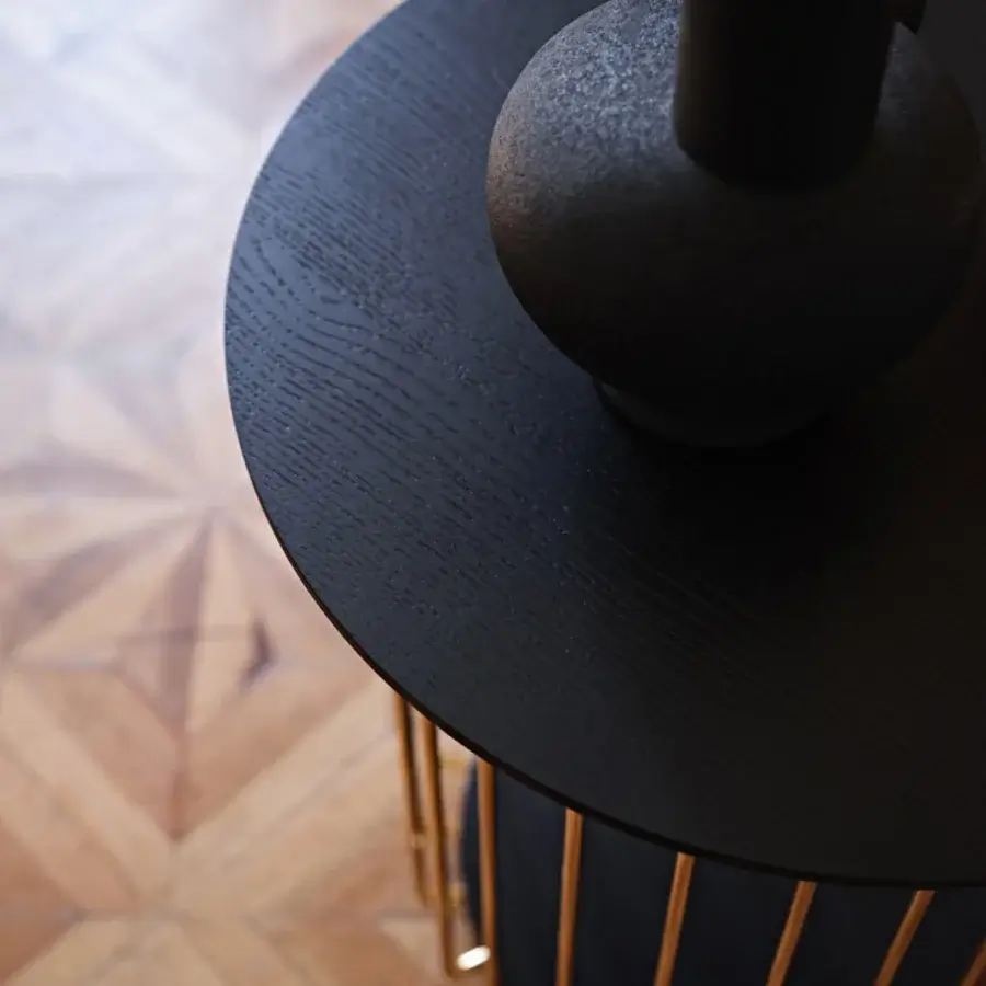 Exceptional Black Tie Etan side table with matte black tabletop and cylindrical dark textile base built with polished gold-tone supports