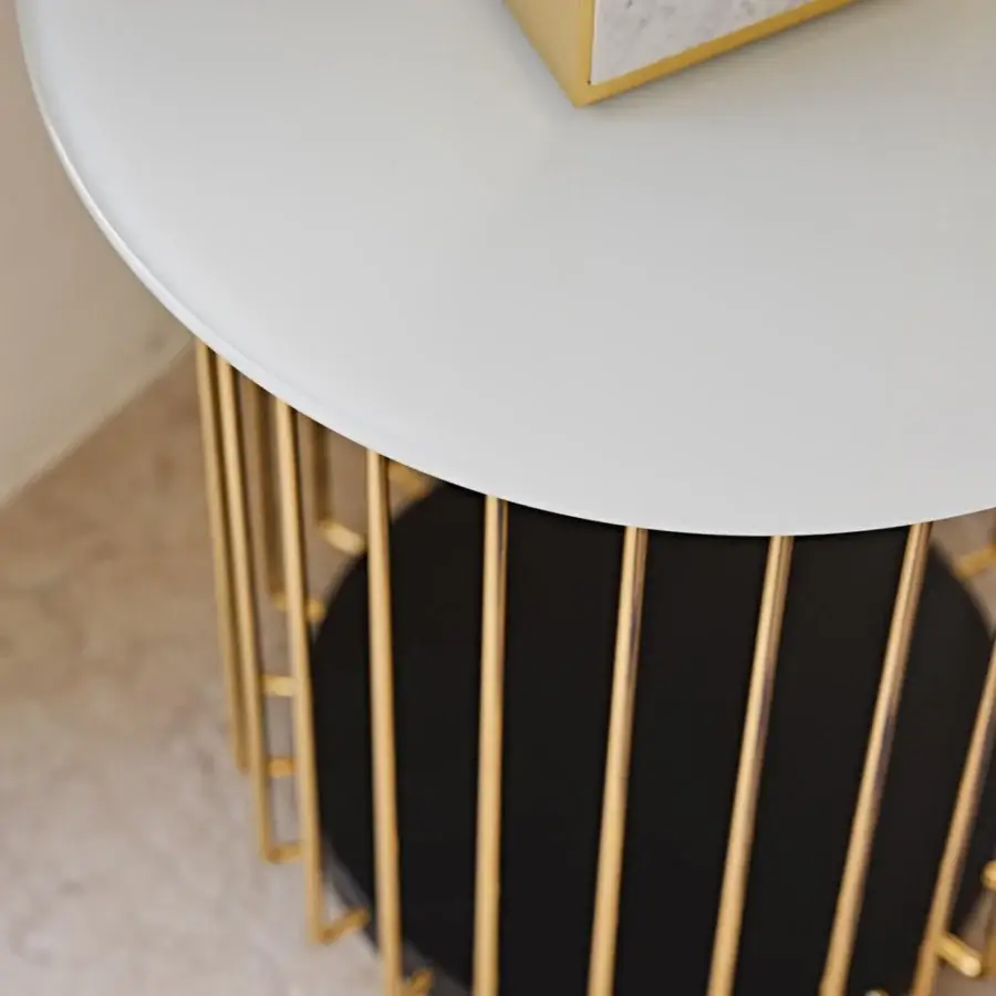 Distinguished Black Tie Etan side table with matte white tabletop and sleek black lacquered base encircled in gilded metal rods