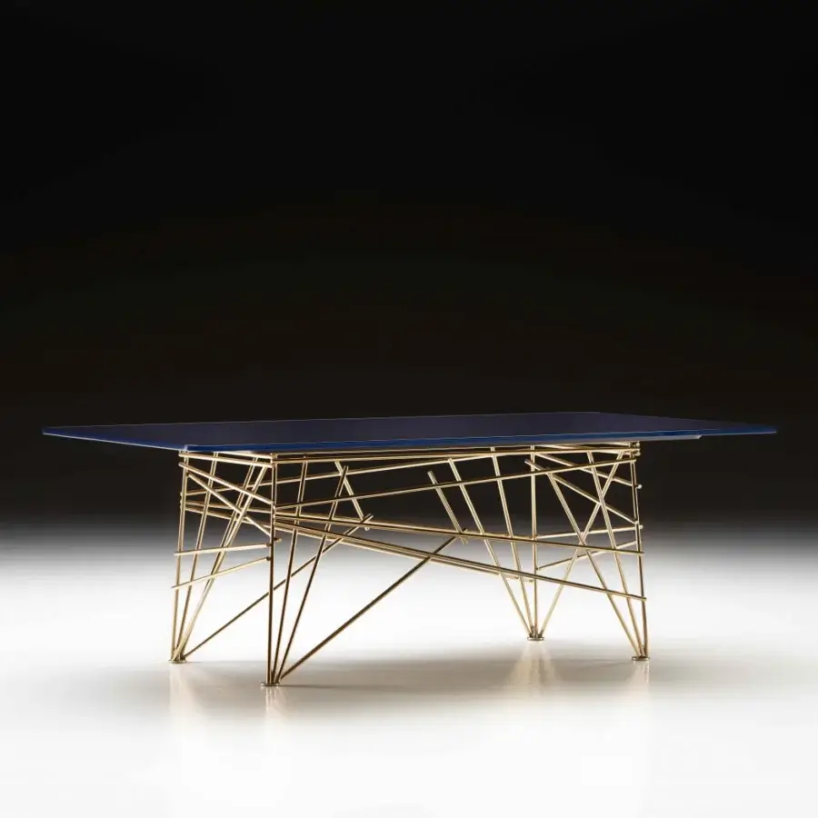Distinguished Black Tie coffee table with back-lacquered glass top and intricately woven golden metal base