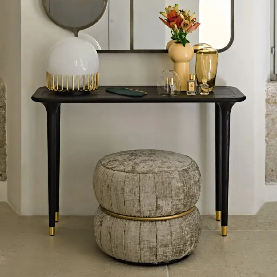 Distinguished Black Tie Livia console crafted in dark-toned wood with satin finish and delicate golden metal feet