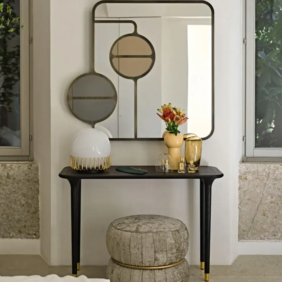 Exceptional Black Tie Livia console crafted in wood with a dark satin finish and delicate golden-toned metal feet
