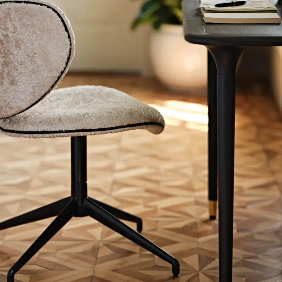 Elegant Black Tie Livia console crafted in Italy with a dark tabletop and slender matte black conical legs accented by gold feet