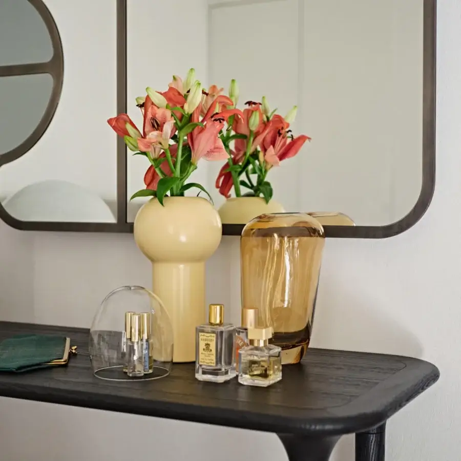 Exceptional Black Tie Livia console crafted in Italy with wood and a dark satin finish featuring conical legs