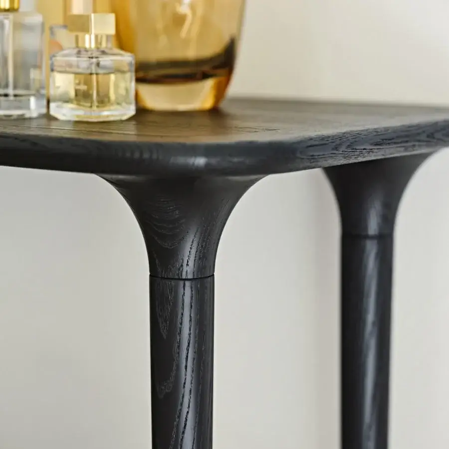 Distinguished Black Tie Livia console crafted in Italy with dark-toned wood and gently curved lines for a contemporary matte finish