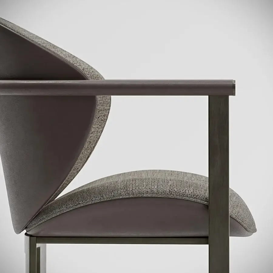 Distinguished Capital Flora armchair with aluminum structure, light-gray textile upholstery and dark-brown tubular leather armrests with galvanic finish